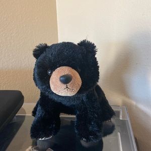 Small black destination nation bear
